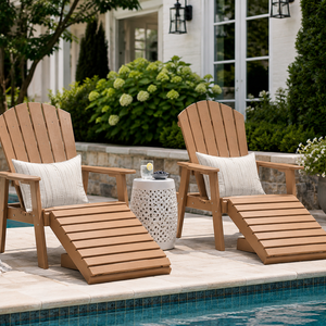 Weathered wood poly Adirondack chair with matching ottoman beside a backyard pool, styled for relaxing outdoor living.