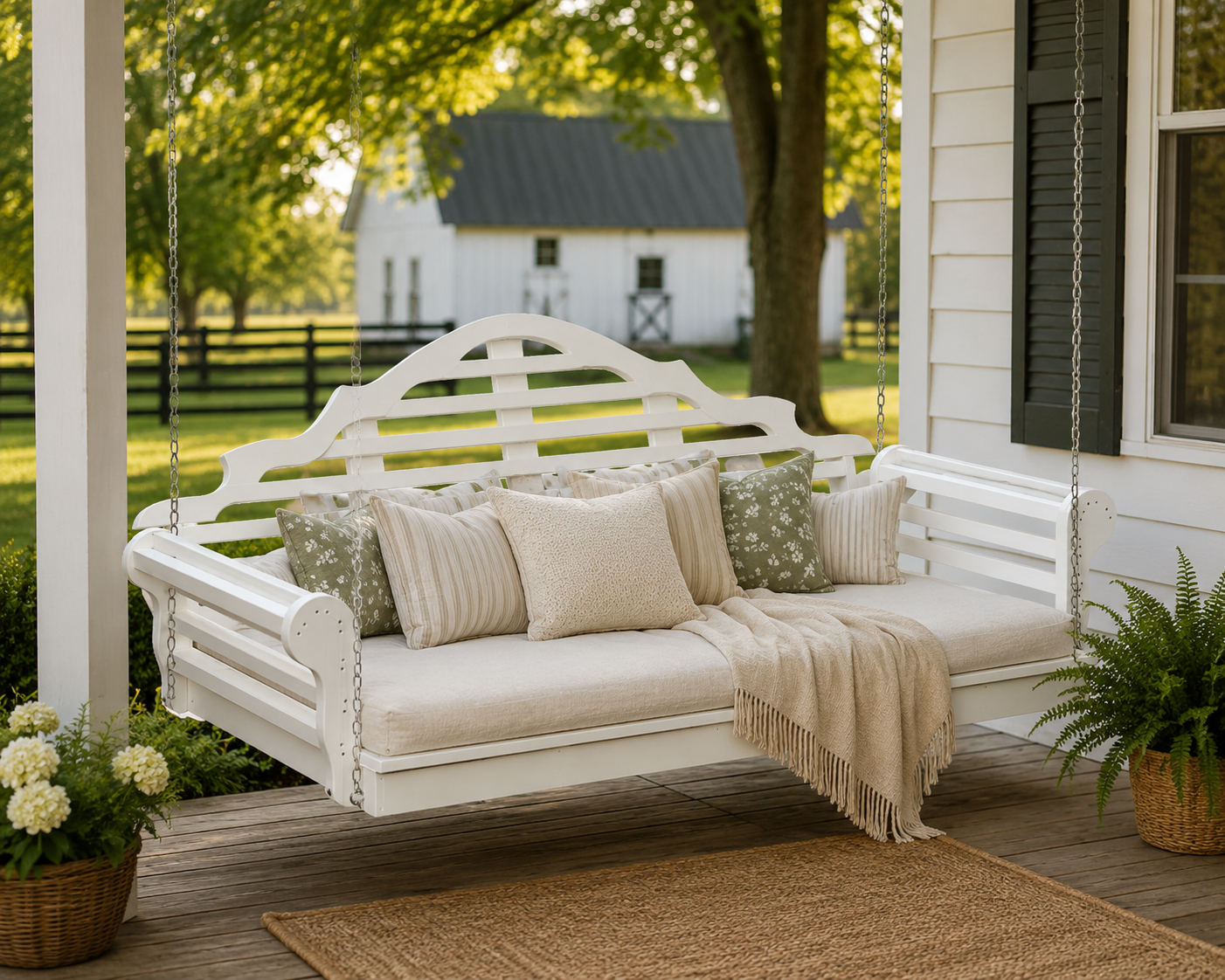Waterproof white poly porch swing bed with neutral cushions on a classic farm porch for cozy outdoor living