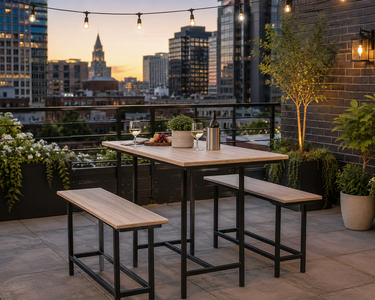 Modern poly and powder coated steel bar-height table and bench set on an urban rooftop patio with city skyline views