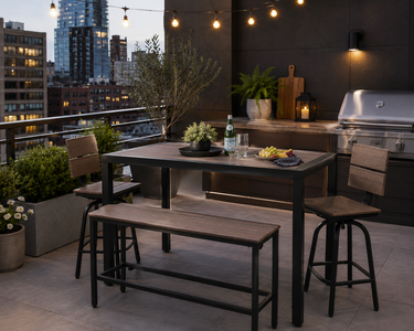 Modern outdoor dining set with bench and stools on a rooftop patio featuring an outdoor kitchen and city skyline.